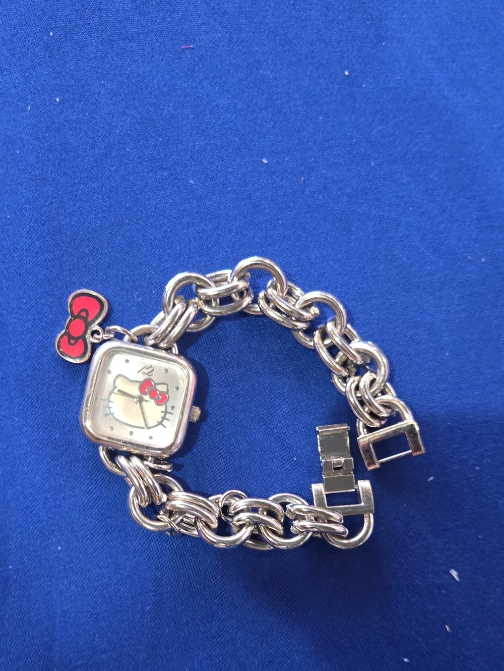 Hello Kitty Silver Bracelet Watch with Red Bow Charm